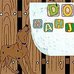 Ahşap zemin üzerine, renkli bloklar üzerinde DOG MAHJONG yazısı ve tasmalı bir köpek