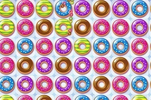 Renkli şekerler ve donutlarla dolu bir grid deseni