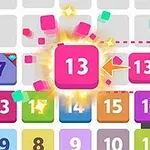 Renkli sayılarla dolu bir ızgarada patlayan pembe 13 sayısını gösteren bir görüntü
