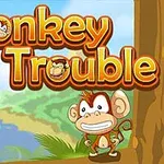 Ormanda neşeli bir maymun ve Monkey in Trouble yazısı