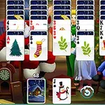 Arka planda noel temalı bir ortamda sıralı kâğıt desteleri ve alt kısımda kartlar yer alıyor